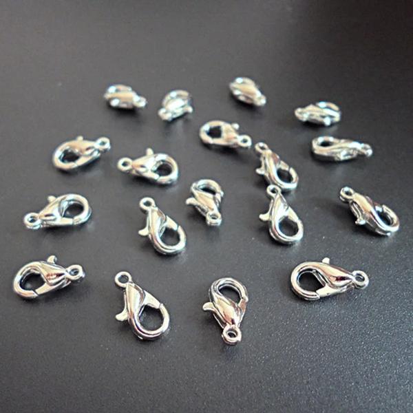 * ロブスタークラスプ * 材料: 金属 * サイズ: 10x 5mm 12x 6mm 14x 8mm 16x9mm * カラー: 銀メッキ * 数量: 50ピース/ロット * 梱包:( 1) 厚手の
